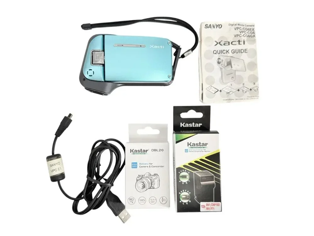 Sanyo Xacti VPC-E1 Waterproof Digital Camcorder Camera New Battery Charger WORKS